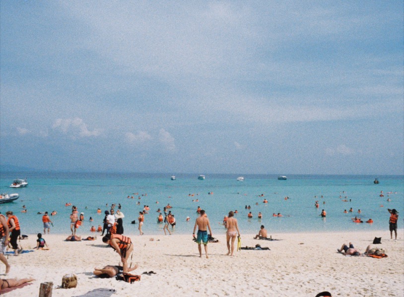 A beach in Phuket where they made EVERYONE wear a life jacket? So we opted not to go in the water, January 2026; Lomo Tiger`